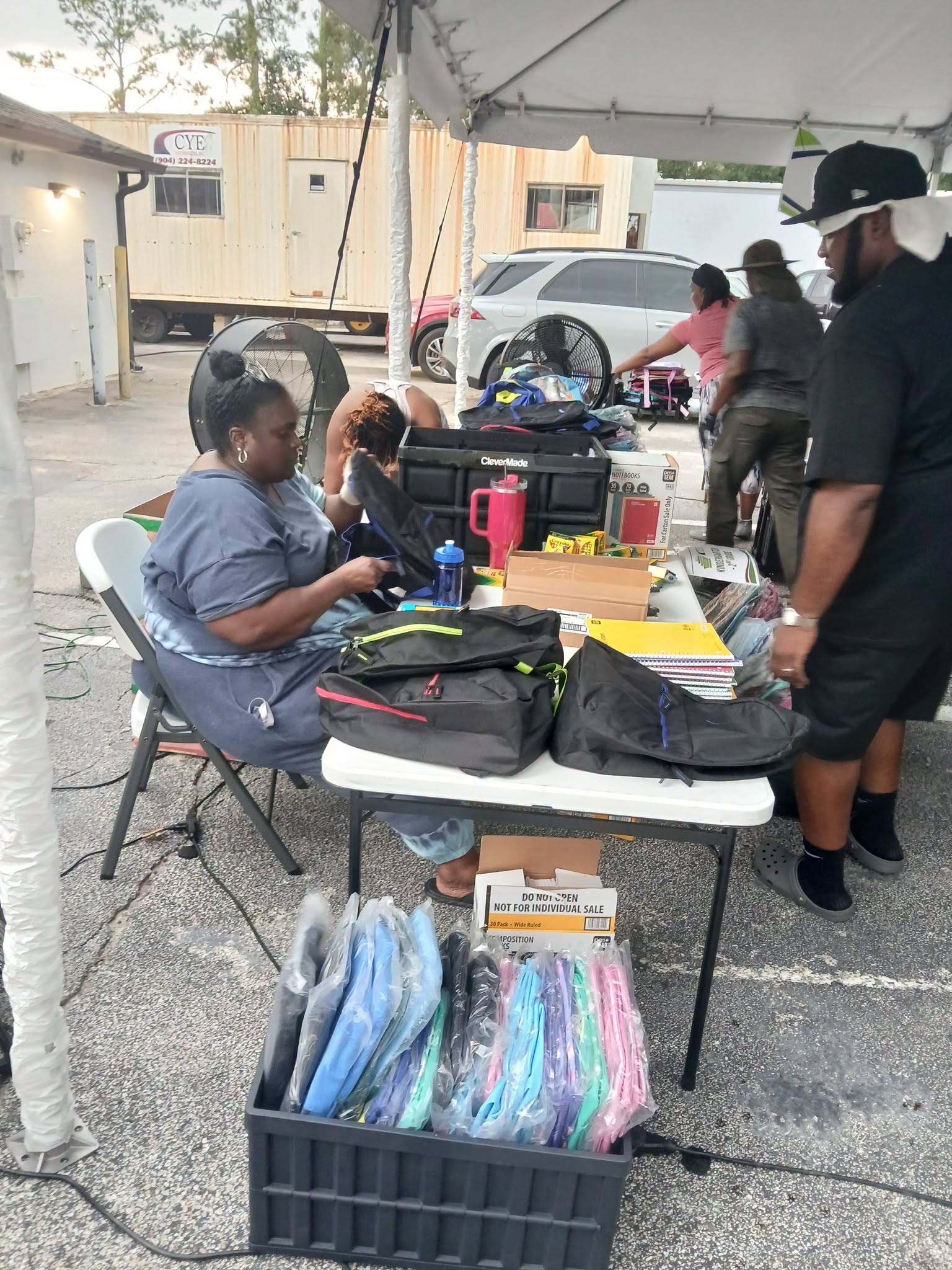 Back to School Drive-Up — Packing Backpacks for Students